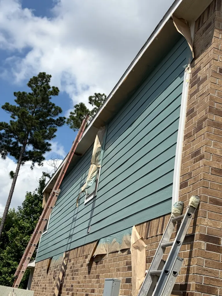 Client-confirmed after photo for North Houston exterior siding repaint