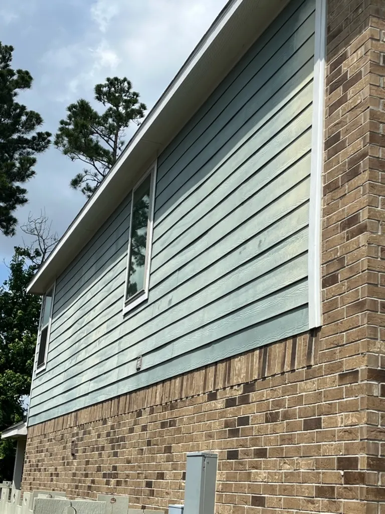 Client-confirmed before photo for North Houston exterior siding repaint